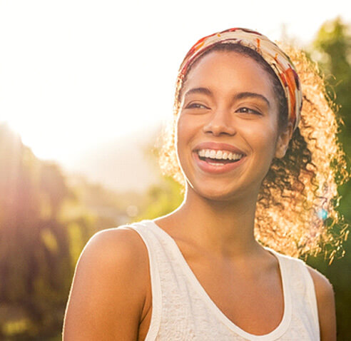 Woman smiling in the sun