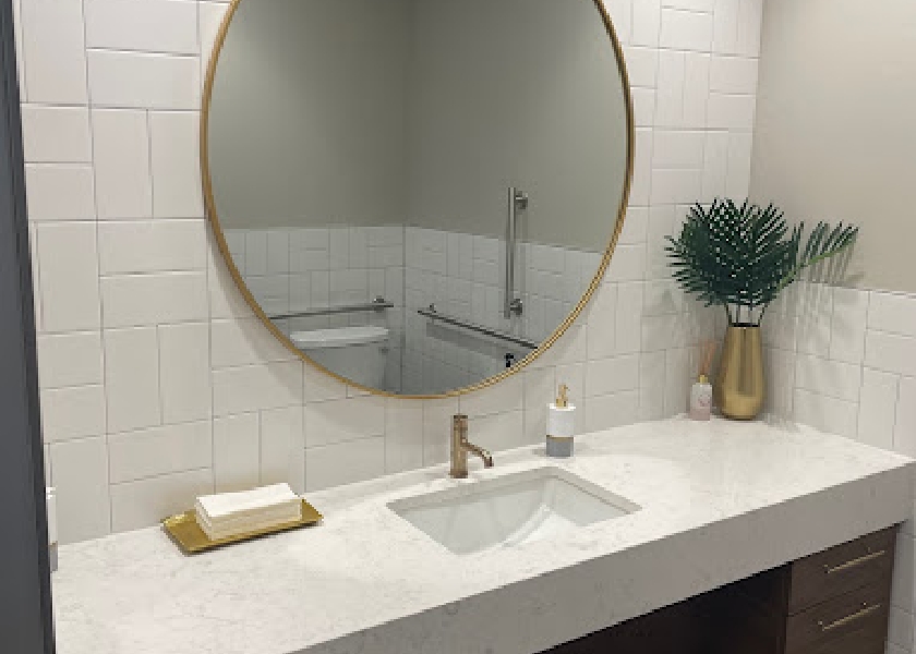 Sink and mirror in restroom