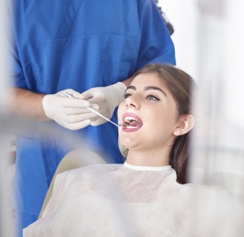 Woman receiving a dental checkup