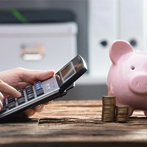 Calculator and piggy bank