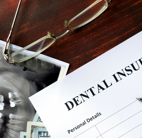 Dental insurance form sitting on a desk