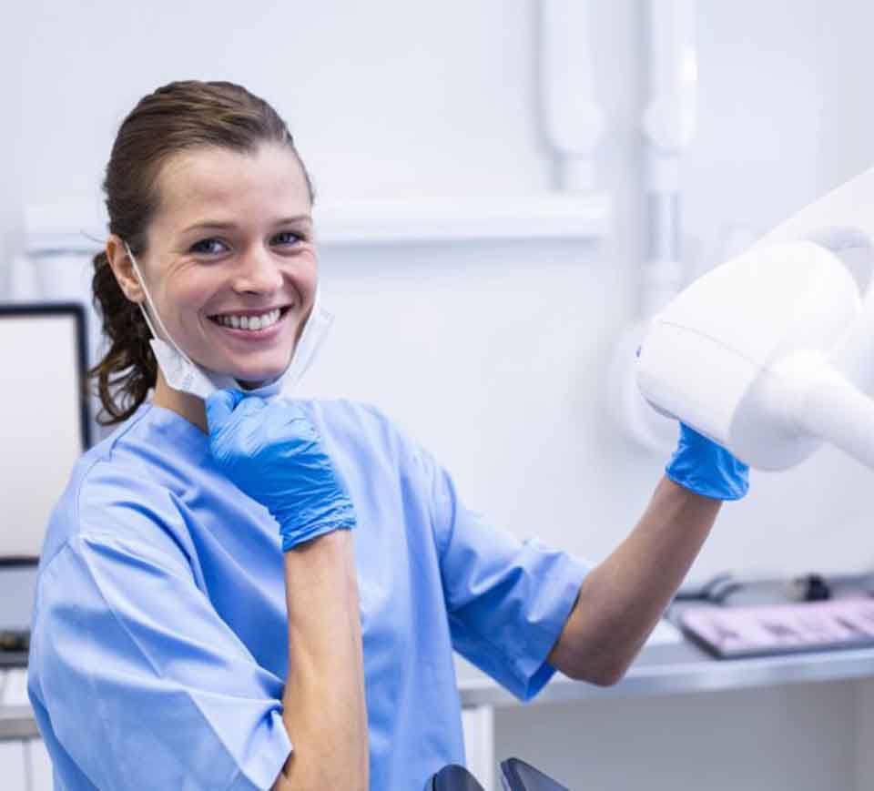 Dental hygienist smiles