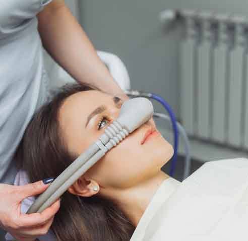Lady receives nitrous oxide