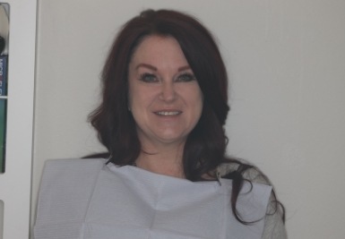 Smile with slightly gapped and discolored teeth